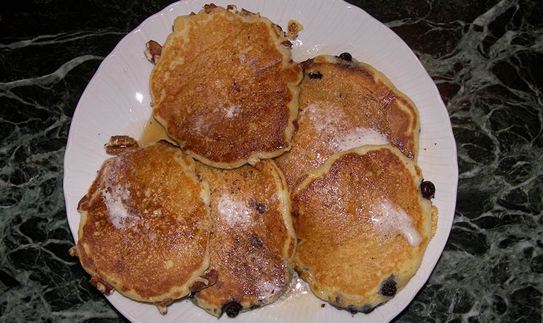 organic blueberry pancakes to be served with pure maple syrup