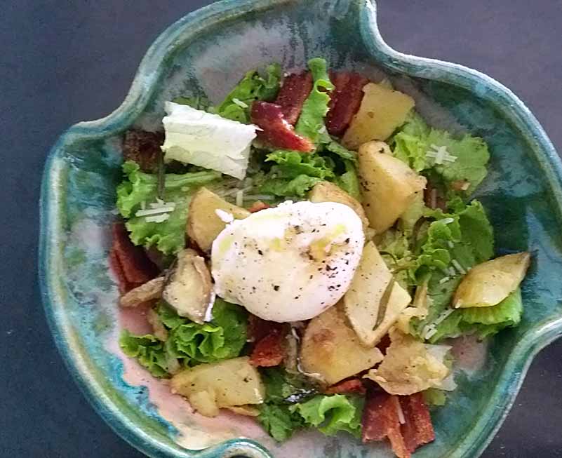 Small salad with poached egg