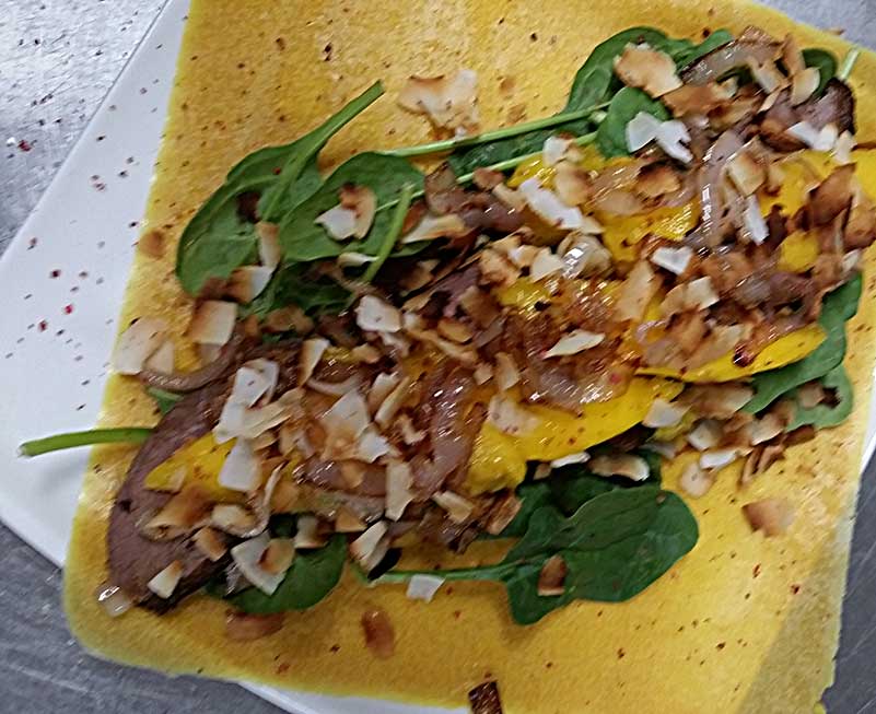 Coconut wraps filled with duck breast, mango, fresh spinach ...